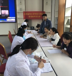 牙周病科党支部党团联动下基层，校企合作促健康